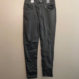 Grey distressed skinny jeans